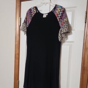 Stylish Black Dress with Colorful Patterned Sleeves
